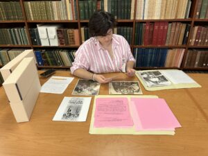 Lydia the new GA sits in the NMNH archive while looking at archival materials.